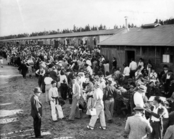 Description Tanforan (Calif.) Assembly Center   evacuees prepare to 