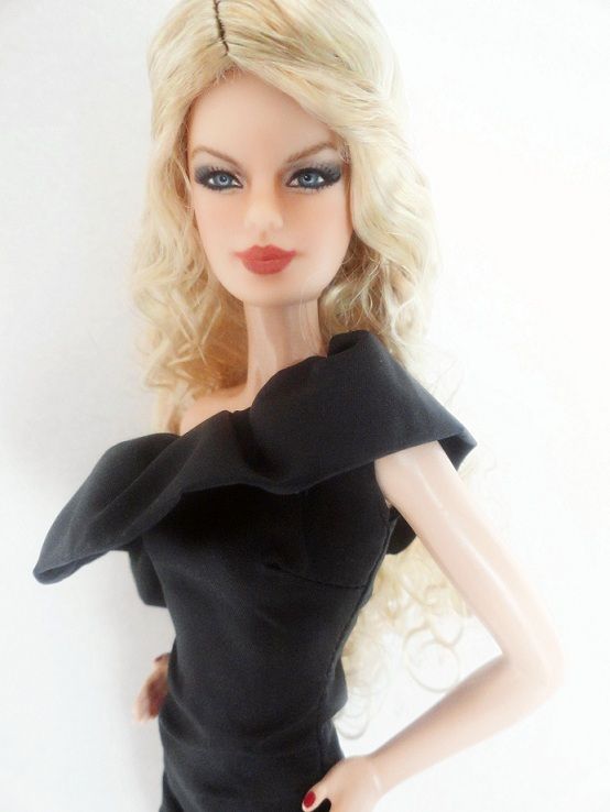 One of the Barbie Basics, repainted and wigged to look like talented 