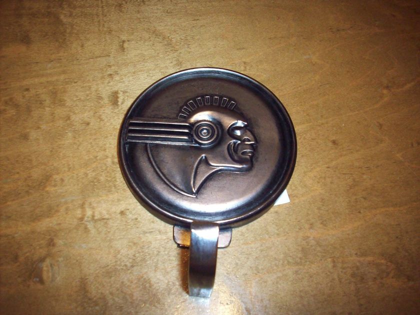   pontiac emblem coat hanger made licensed by gm when hung on a wall