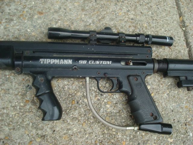 TIPPMANN CUSTOM 98 FLATLINE SNIPER MARKER W SCOPE & STOCK  