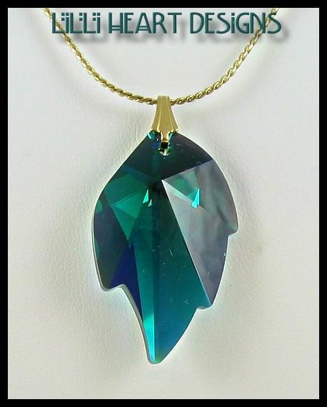 BRAND NEW FROM SWAROVSKI EMERALD GREEN LEAF PENDANT  